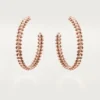 Clash De Cartier hoop-øreringer, liten modell – rosagull – Cartier