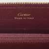 Internasjonal lommebok med glidelås, Must De Cartier – burgunderfarget kalveskinn, gullfinish – Cartier
