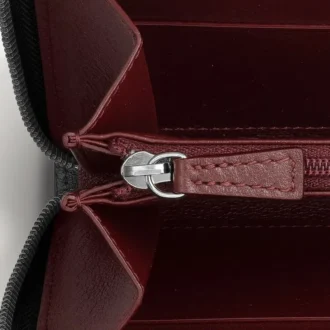 Internasjonal lommebok med glidelås, Must De Cartier – svart kalveskinn, palladiumfinish – Cartier