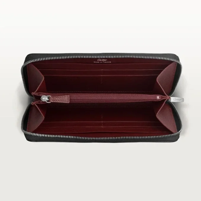 Internasjonal lommebok med glidelås, Must De Cartier – svart kalveskinn, palladiumfinish – Cartier