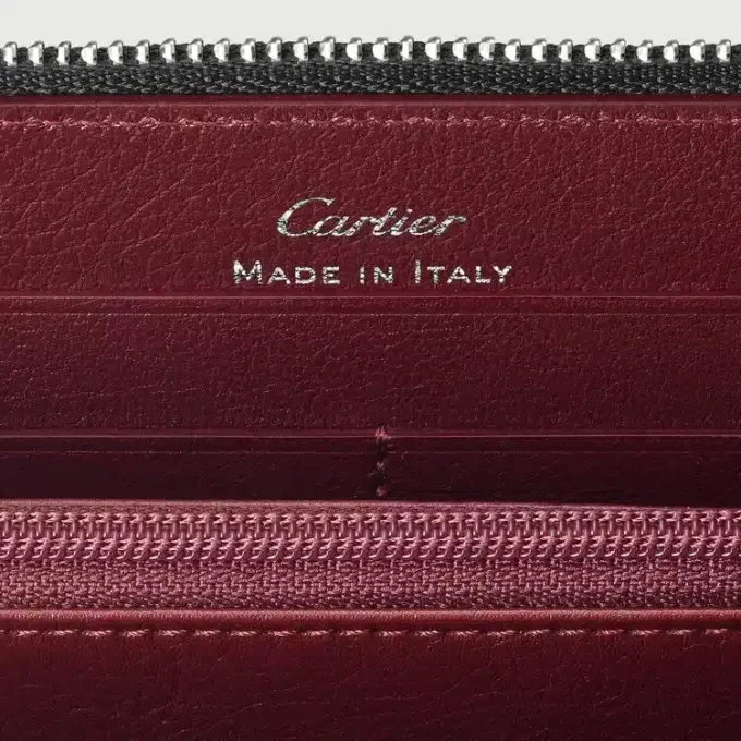 Internasjonal lommebok med glidelås, Must De Cartier – svart kalveskinn, palladiumfinish – Cartier