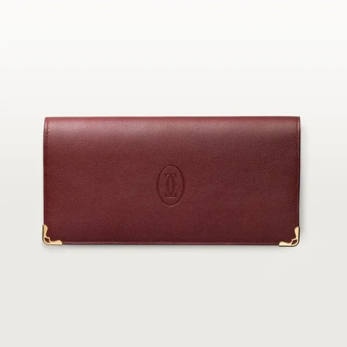 Internasjonal lommebok med sidefolder, Must De Cartier – burgunder kalveskinn, gullfinish – Cartier