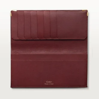 Internasjonal lommebok med sidefolder, Must De Cartier – burgunder kalveskinn, gullfinish – Cartier