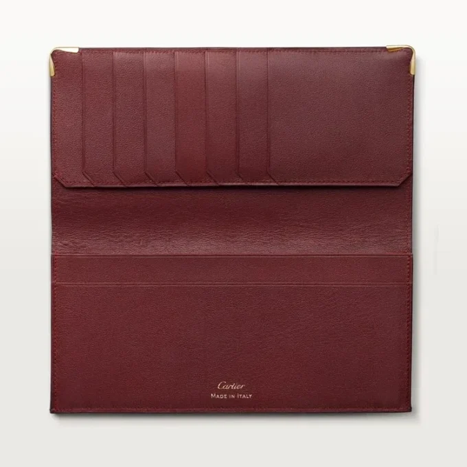Internasjonal lommebok med sidefolder, Must De Cartier – burgunder kalveskinn, gullfinish – Cartier