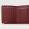 Lommebok med flere lommer, Must De Cartier – burgunderfarget kalveskinn, gullfinish – Cartier