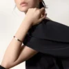 Love-armbånd, klassisk modell