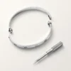 Love-armbånd, klassisk modell