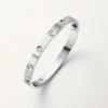 Love-armbånd, klassisk modell, børstet, 4 diamanter