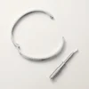 Love-armbånd, medium modell, 4 diamanter