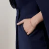 Love-armbånd, på kjede