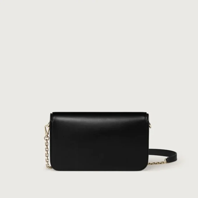 Mini-kjedeveske, Double C De Cartier – svart kalveskinn, gull og svart emaljefinish – Cartier