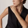 Panthere De Cartier-armbånd – gult gull, lakk, diamant, tsavorittgranat, onyx – Cartier