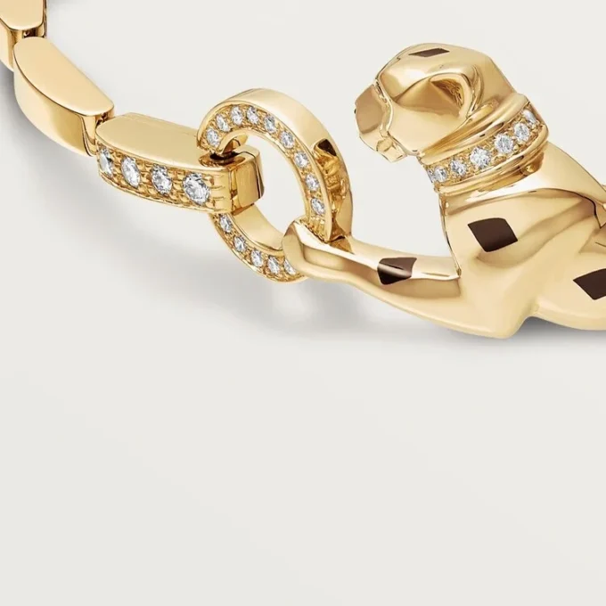 Panthere De Cartier-armbånd – gult gull, lakk, diamant, tsavorittgranat, onyx – Cartier