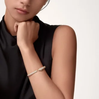 Panthere De Cartier-armbånd, liten modell, halvbelagt