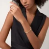 Panthere De Cartier-armbånd, liten modell, halvbelagt