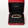 Panthere De Cartier-armbånd, liten modell, halvbelagt