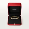 Panthere De Cartier-armbånd, liten modell, halvbelagt