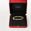 Panthere De Cartier-armbånd, liten modell, halvbelagt