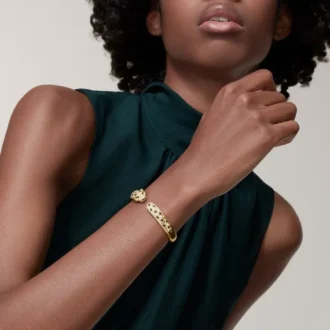 Panthere De Cartier-armbånd, medium modell, halvbelagt