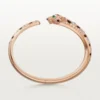 Panthere De Cartier-armbånd, medium modell, halvbelagt