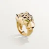 Panthere De Cartier-ring – gult gull, lakk, tsavorittgranat, onyx – Cartier