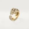 Panthere De Cartier-ring – gult gull, smaragder, onyx, diamanter – Cartier