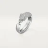 Panthere De Cartier-ring – hvitt gull, smaragder, onyx, diamanter – Cartier