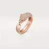 Panthere De Cartier-ring – Rosagull, onyx, smaragder, diamanter – Cartier