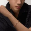 Santos De Cartier-armbånd, kjede, medium modell