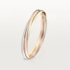 Trinity-armbånd i trefarget gull, klassisk modell | Cartier Us