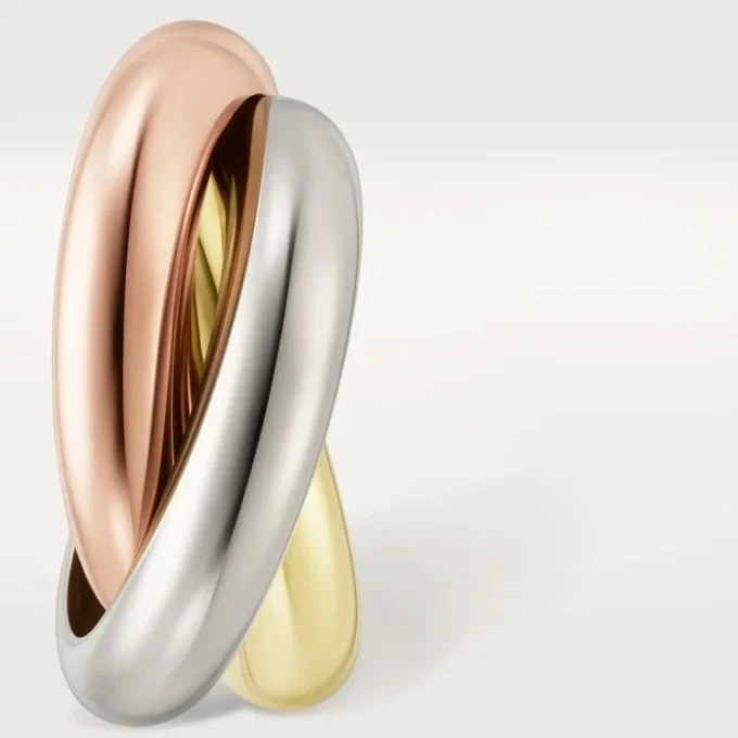 Trinity Hoop-øreringer i trefarget gull | Cartier Us
