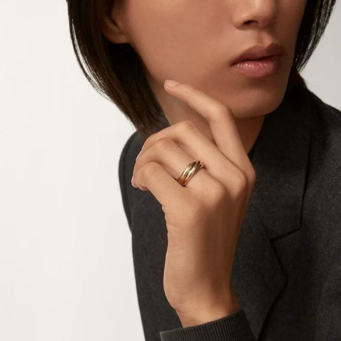 Trinity-ring i trefarget gull, klassisk modell | Cartier Us Trinity-ring i trefarget gull, klassisk modell | Cartier Us